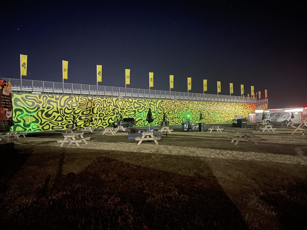 Night time Silverstone event branding installation Lando